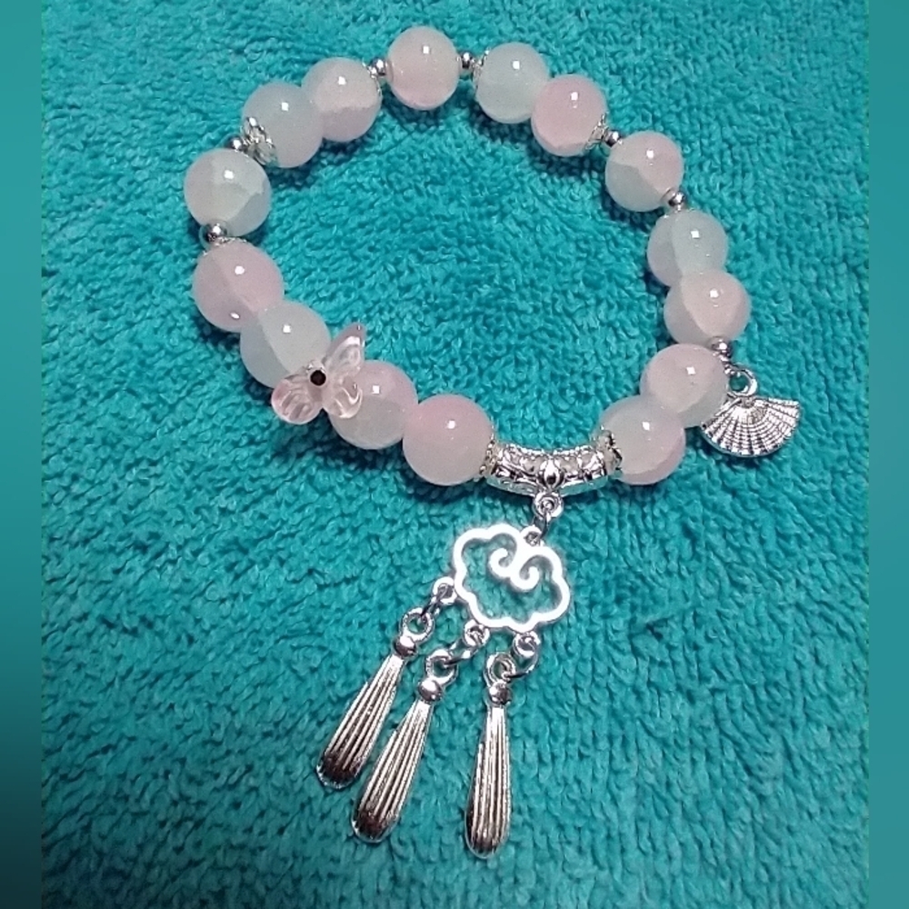 Silvertone very light pink whitish broken flower stretch dangle charm bracelet